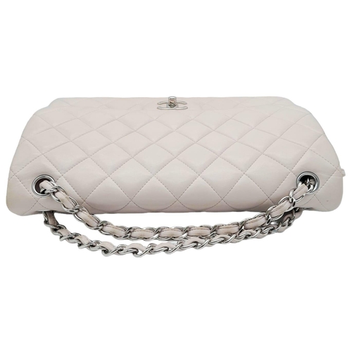 53 - Chanel Baby Pink Classic Flap Bag.
Quality quilted diamond stitch Chanel, with silver toned hardware... 