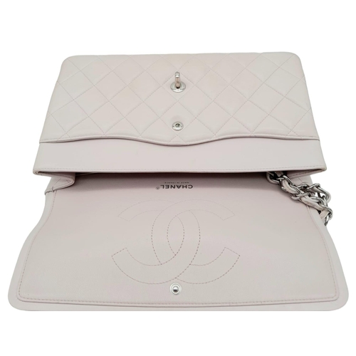 53 - Chanel Baby Pink Classic Flap Bag.
Quality quilted diamond stitch Chanel, with silver toned hardware... 