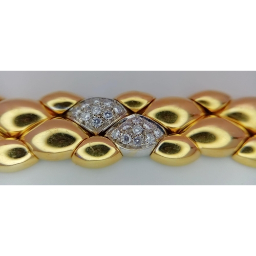 71 - An 18K Yellow Gold and Diamond Ladies Bracelet. Rich gold droplets of 18k gold interspersed with 90 ... 