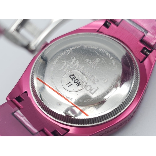 745 - A Vivienne Westwood Shocking Pink Ceramic 'Let it Rock' Quartz Watch. Ceramic bracelet and case - 35... 