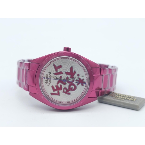 745 - A Vivienne Westwood Shocking Pink Ceramic 'Let it Rock' Quartz Watch. Ceramic bracelet and case - 35... 