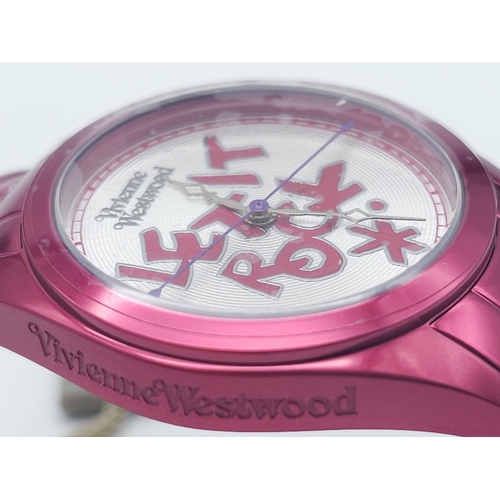 745 - A Vivienne Westwood Shocking Pink Ceramic 'Let it Rock' Quartz Watch. Ceramic bracelet and case - 35... 