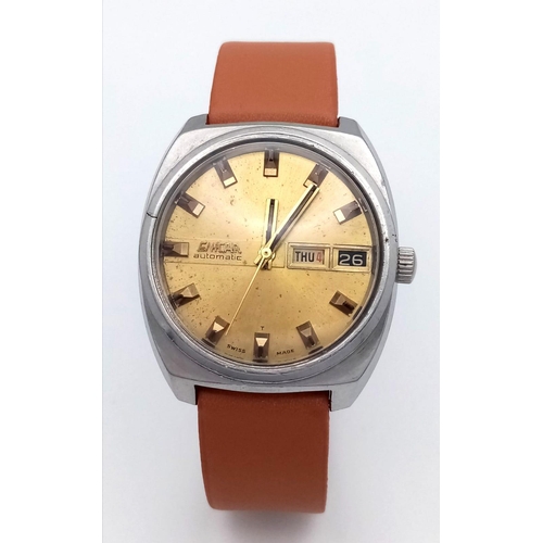 759 - A Vintage Enicar Automatic Gents Watch. Brown leather strap. Stainless steel case - Gilded dial with... 