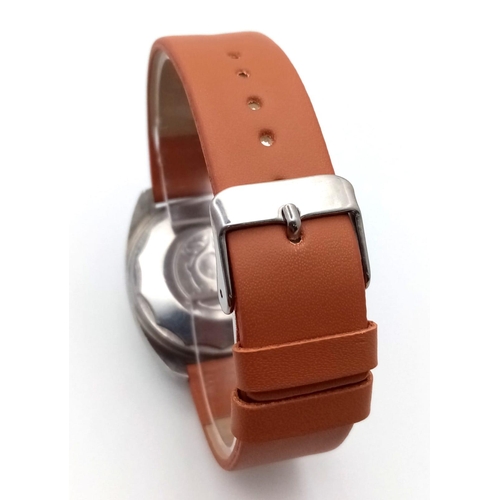 759 - A Vintage Enicar Automatic Gents Watch. Brown leather strap. Stainless steel case - Gilded dial with... 