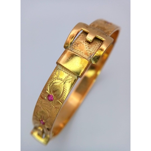 774 - A Vintage Fine Gold Hard Plated Ruby Set Buckle Design Hinge Bracelet.
6.3cm Inner width. Set with F... 