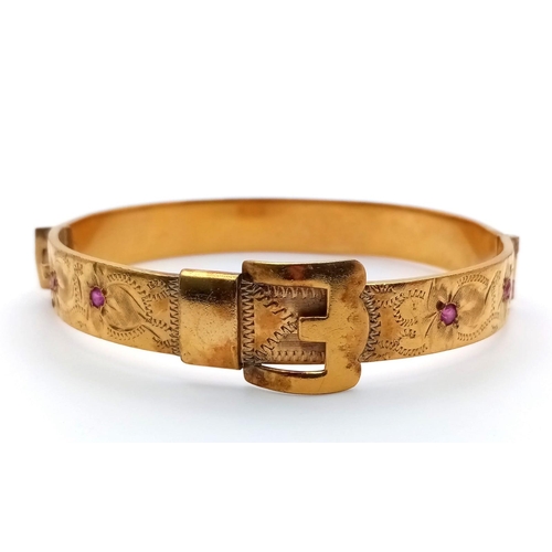 774 - A Vintage Fine Gold Hard Plated Ruby Set Buckle Design Hinge Bracelet.
6.3cm Inner width. Set with F... 