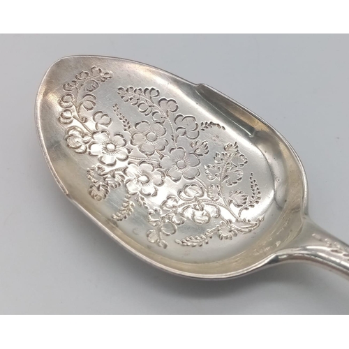 854 - AN UNUSUAL SHOVEL SHAPED ORNATELY DECORATED SOLID SILVER SPOON MADE IN LONDON IN 1891.  29.9gms   15... 