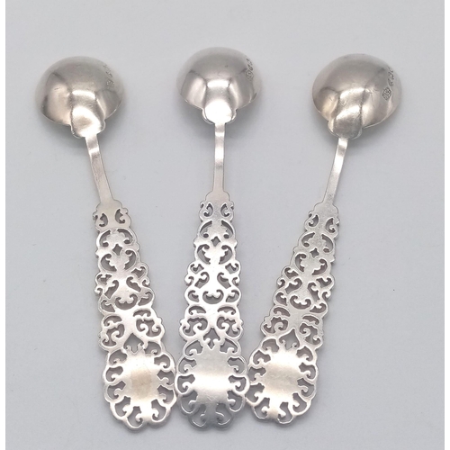 861 - A SET OF 3 ORNATE TEASPOONS MADE IN LONDON IN 1892 WITH FANTASTIC PIERCED WORK HANDLES .   46.9gms