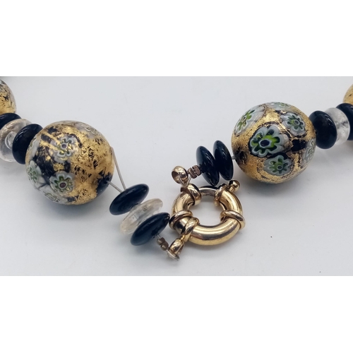 982 - An Exquisite Vintage, Hand Crafted, Venetian Millifiori Glass Bead Gilt
Necklace. Each Bead measures... 