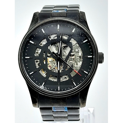 An Unworn Ex Display Caravelle New York Bulova Men s Skeleton Automatic Watch. 45mm Including Crow