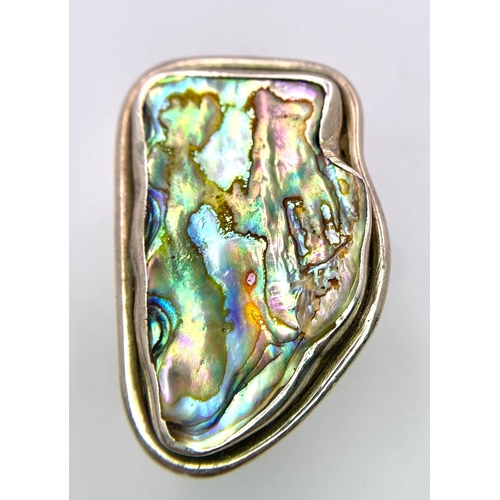 1003 - A Vintage Celtic Sterling Silver Modernist Design Abalone Set Ring Size Q.
Crown Measures 4cm Length... 