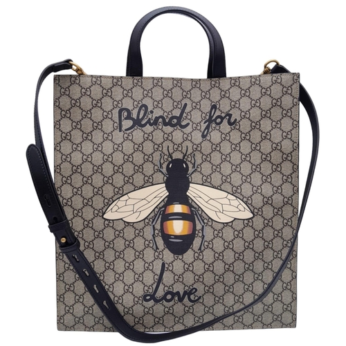 115 - Gucci Supreme 'Blind For Love' Shopper Bag.
Quality leather exterior, with canvas GG monogramed look... 