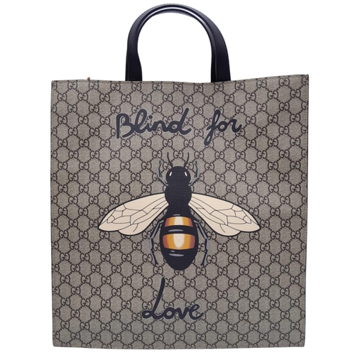 115 - Gucci Supreme 'Blind For Love' Shopper Bag.
Quality leather exterior, with canvas GG monogramed look... 