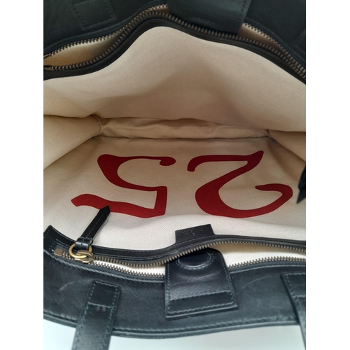 115 - Gucci Supreme 'Blind For Love' Shopper Bag.
Quality leather exterior, with canvas GG monogramed look... 