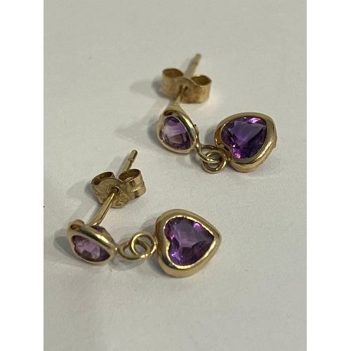 153 - Power of 9 carat GOLD and AMETHYST EARRINGS. Drop style. Complete with gold backs.0.73 grams.