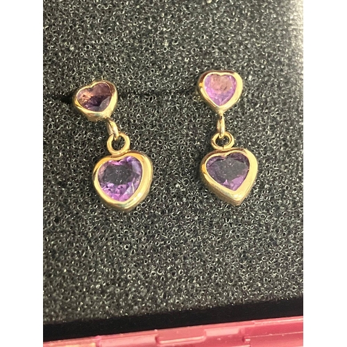 153 - Power of 9 carat GOLD and AMETHYST EARRINGS. Drop style. Complete with gold backs.0.73 grams.