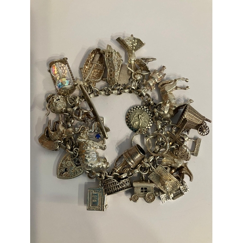 160 - Vintage SILVER CHARM BRACELET Absolutely loaded with Silver charms (some opening up) to include hors... 