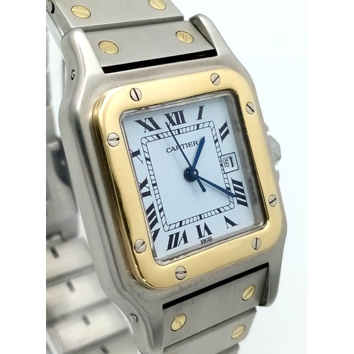 162 - A Santos de Cartier Bi-Metal Watch. Gold and stainless steel bracelet and case - 29mm width. White d... 