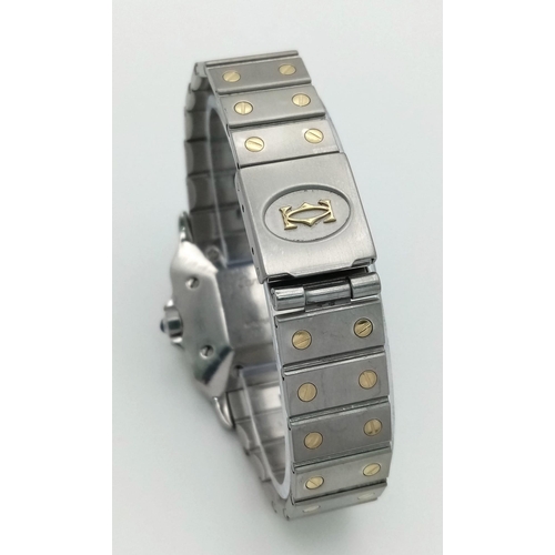 162 - A Santos de Cartier Bi-Metal Watch. Gold and stainless steel bracelet and case - 29mm width. White d... 