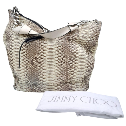 164 - A Classic Jimmy Choo Snakeskin Leather Hobo Bag.
With a unique double zip lock top and a twisted thi... 