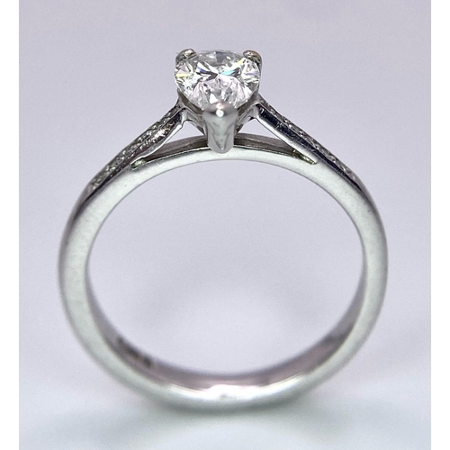 255 - 18K WHITE GOLD 0.60CT PEAR SHAPED SOLITAIRE DIAMOND RING, WITH  FURTHER DIAMOND ON SHOULDERS, WEIGHT... 