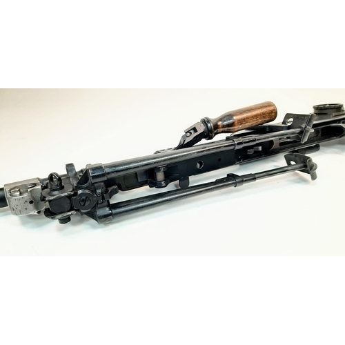 318 - A DEACTIVATED BREN GUN WITH INTEGRAL SPRING LOADED SUPPORT FEET . THIS ACTUAL GUN WAS USED FOR TRAIN... 