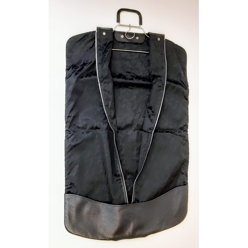 514 - Birioni Black Leather Suit Cover Hanger Bag.
Quality leather one side and patterned textile the othe... 