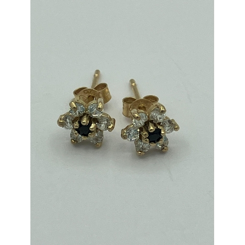 518 - 9 carat GOLD and SAPPHIRE EARRINGS, Having centre Sapphire with clear stone surround. Attractive dai... 