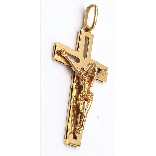 554 - 18k yellow gold heavy weight crucifix pendant (5cm x 3cm) weight 13g