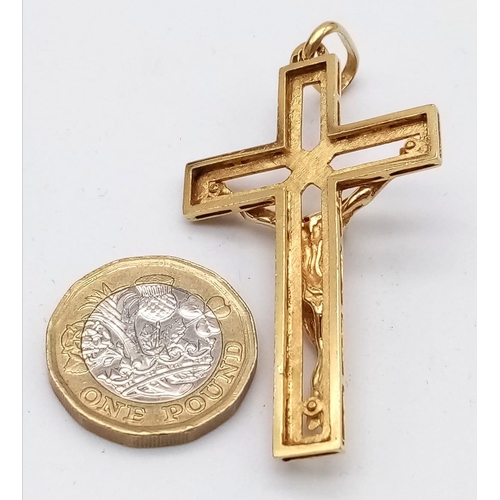 554 - 18k yellow gold heavy weight crucifix pendant (5cm x 3cm) weight 13g