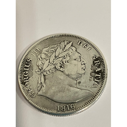 56 - GEORGE III SILVER HALF CROWN 1816. Bullhead large bust. Extra fine/ Possibly brilliant with a gentle... 