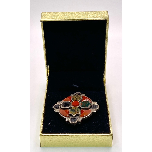 648 - A Rare Antique (Possibly Victorian) Celtic Hardstone Silver Brooch that can
also be worn as a Pendan... 