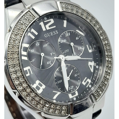 689 - A Unisex Clear Stone Set Bezel Watch by Guess. 42mm Including Crown.
Full Working Order. In Presenta... 