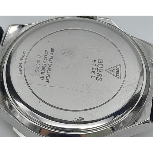 689 - A Unisex Clear Stone Set Bezel Watch by Guess. 42mm Including Crown.
Full Working Order. In Presenta... 