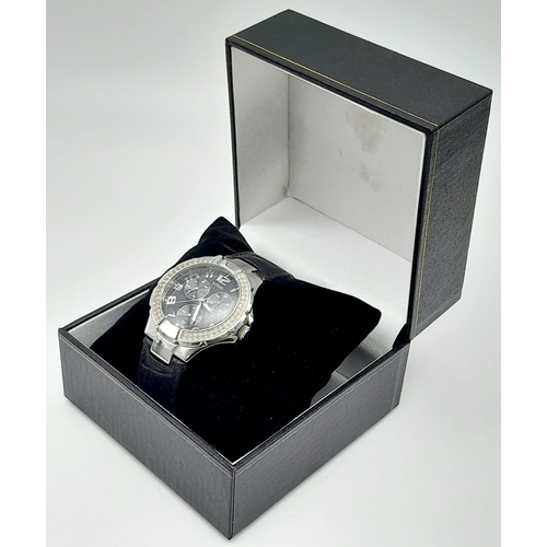 689 - A Unisex Clear Stone Set Bezel Watch by Guess. 42mm Including Crown.
Full Working Order. In Presenta... 