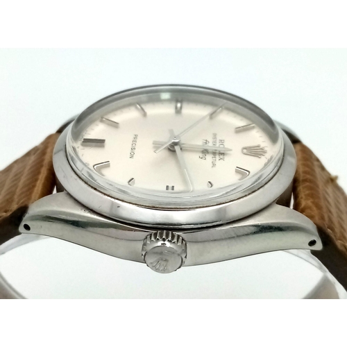 73 - A Vintage Rolex Air King Precision Gents Watch. Brown leather strap. Stainless steel case - 35mm. Si... 