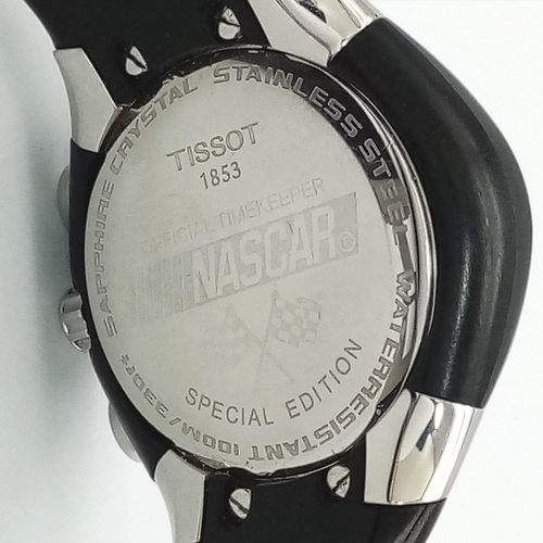 738 - A Tissot Nascar Quartz Gents Chronograph Watch. Original black rubber strap. Steel and rubber case -... 