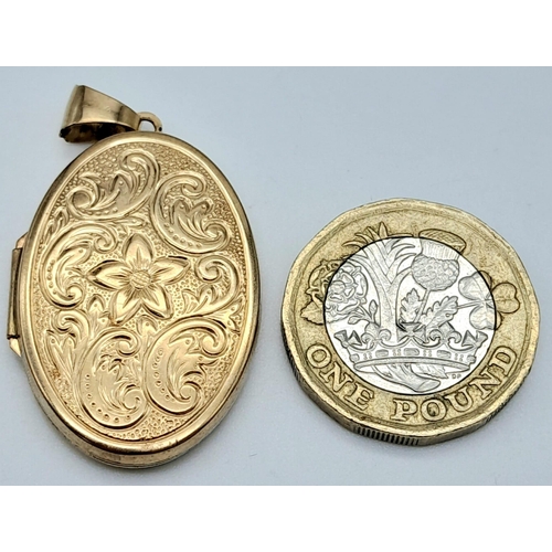 742 - 9k yellow gold engraved locket pendant, 4.3g (3.2cm x 2.3cm)