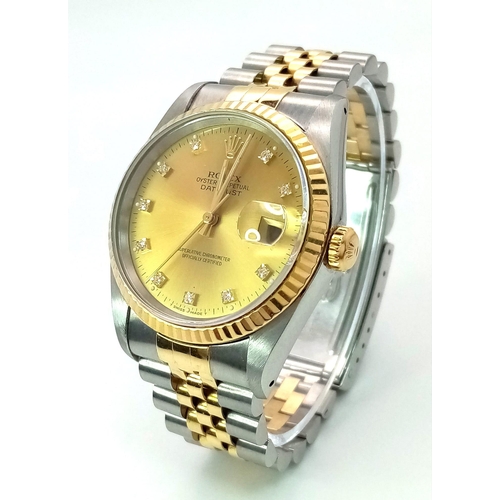 79 - A Rolex Oyster Perpetual Datejust Bi-Metal and Diamonds Gents Watch. 18k gold and stainless steel br... 