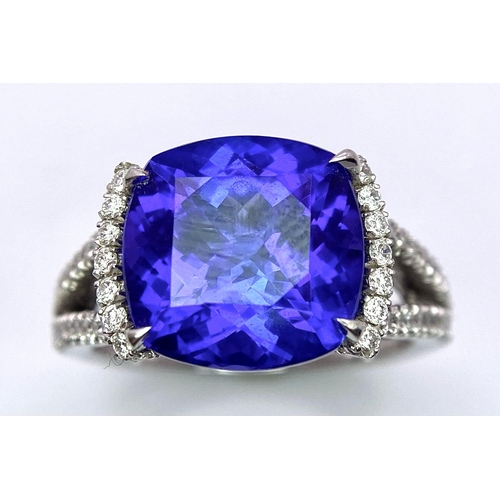 83 - A BESPOKE 18K WHITE GOLD TANZANITE & DIAMOND RING, SET WITH AAA QUALITY CUSHION CUT 6.17CT TANZANITE... 