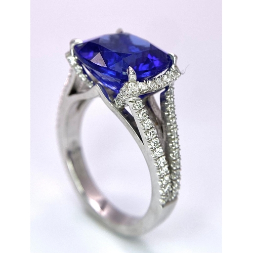 83 - A BESPOKE 18K WHITE GOLD TANZANITE & DIAMOND RING, SET WITH AAA QUALITY CUSHION CUT 6.17CT TANZANITE... 