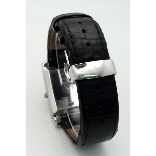 835 - A Fantastic Rotary Revelation Reversible Watch. Black leather strap. Stainless steel reversible case... 