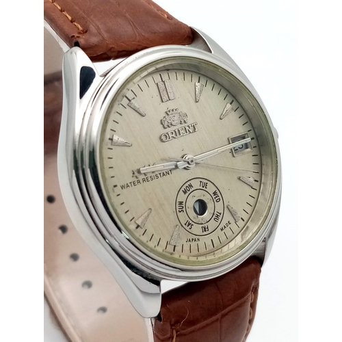 842 - A Vintage Orient Day Pointer Automatic Gents Watch. Brown leather strap. Stainless steel case - 37mm... 