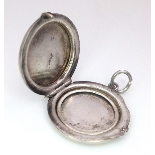 865 - A Vintage Georg Jensen Silver Locket Pendant. Floral Detail. 2cm Diameter.