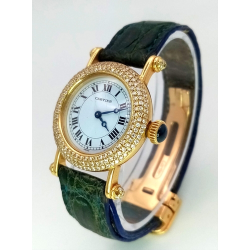 866 - An 18K Gold and Diamond Cartier Ladies Watch. Leather strap with Cartier gold clasp. Circular gold a... 