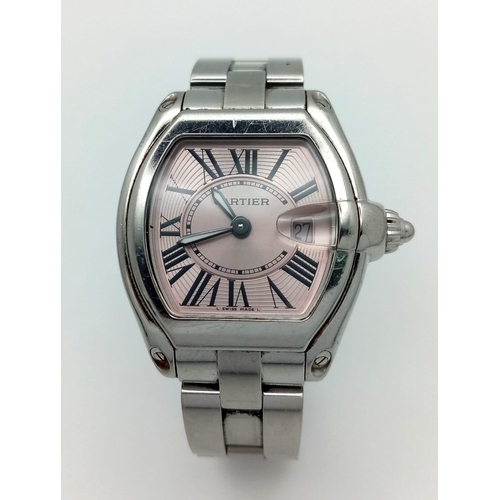 873 - A Cartier Roadster Shocking Pink Dial Ladies Watch. Stainless steel bracelet and case - 31mm. Quartz... 