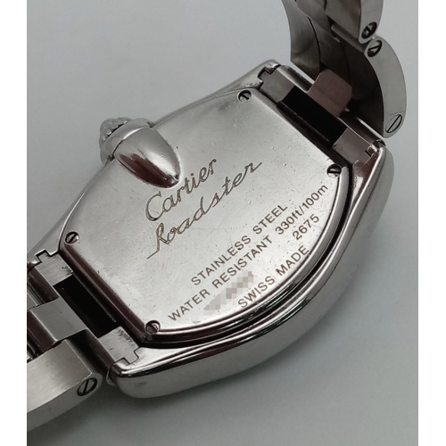 873 - A Cartier Roadster Shocking Pink Dial Ladies Watch. Stainless steel bracelet and case - 31mm. Quartz... 