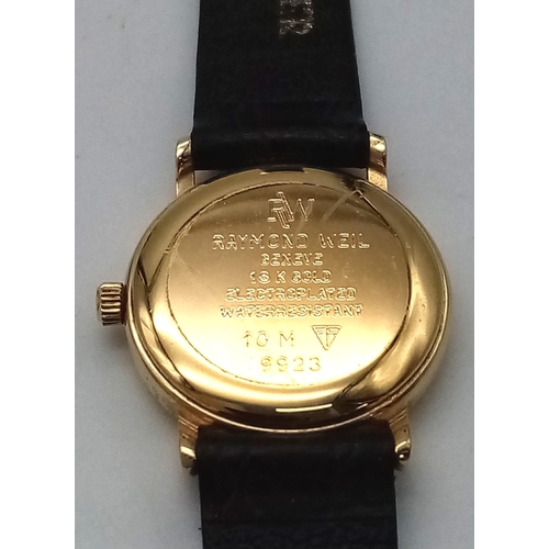 946 - A Raymond Weil 18K Gold Plated Ladies Quartz Watch. Black leather strap. Gold plated case - 22mm. Wh... 