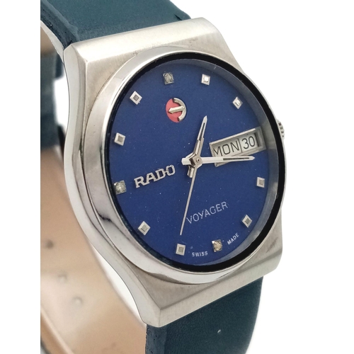 960 - A Vintage Rado Voyager Automatic Gents Watch. Blue leather strap. Stainless steel case - 31mm. Blue ... 