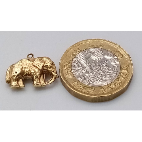 1014 - 9k yellow gold elephant charm/pendant, 0.7g